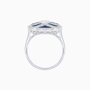 Ocean Wave-Inspired Marquise Diamond and Blue Sapphire Ring in Platinum 950 – 0.79 CT Center