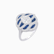 Ocean Waves: Oval-Cut Diamond & Blue Sapphire Platinum Ring