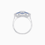 Ocean Waves: Oval-Cut Diamond & Blue Sapphire Platinum Ring