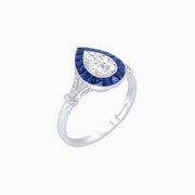 Platinum 950 Pear-Shaped VVS2-E Diamond Ring with French-Cut Blue Sapphire Halo, Diamond Accented Split Shank & Milgrain Detail