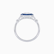 Platinum 950 Pear-Shaped VVS2-E Diamond Ring with French-Cut Blue Sapphire Halo, Diamond Accented Split Shank & Milgrain Detail