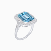 “Ocean’s Embrace” – Platinum Aquamarine & Diamond Art Deco Inspired Halo Ring