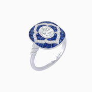 Midnight Bloom: Oval Diamond and Blue Sapphire Halo Ring in Platinum