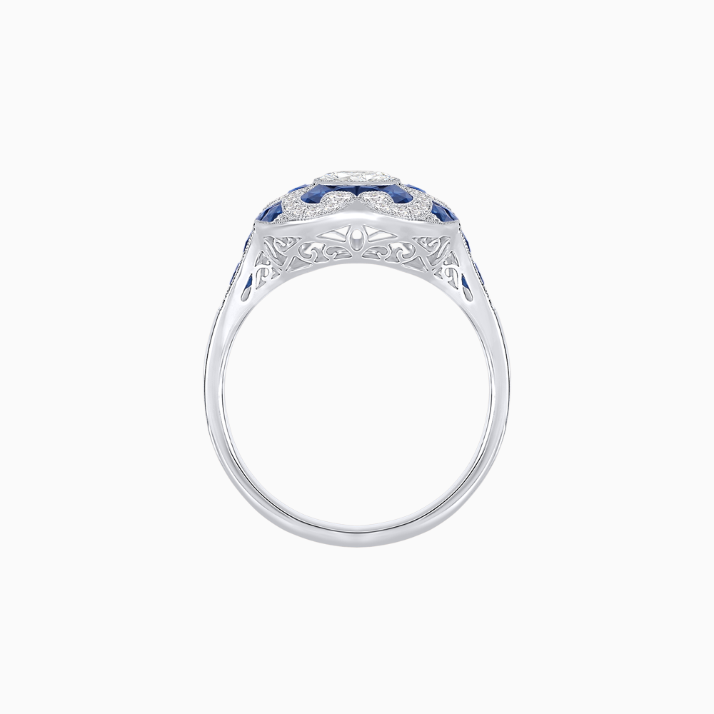Platinum Pear-Shaped Diamond & Calibre Cut Sapphire Ring with Vintage-Inspired Milgrain Detailing