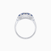 Platinum Pear-Shaped Diamond & Calibre Cut Sapphire Ring with Vintage-Inspired Milgrain Detailing