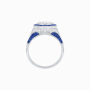 Art Deco–Inspired Platinum Diamond & Blue Sapphire Halo Ring with Handcrafted Milgrain