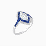 Platinum Marquise Diamond and French Cut Blue Sapphire Halo Ring