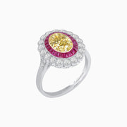 Oval Fancy Yellow Diamond Ring with French Cut Rubies & Diamond Cluster Halo in Platinum and 18K Yellow Gold
