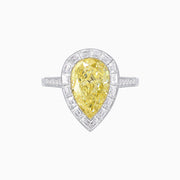 Platinum and 18K Yellow Gold Pear Shape Fancy Yellow Diamond Ring with Baguette Halo