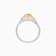 Elegant Pear Shape Fancy Yellow Diamond Engagement Ring with Baguette Halo