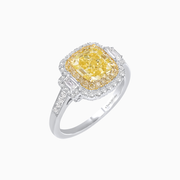 Double Halo Cushion Cut Fancy Yellow Diamond Ring with Tapered Diamond Accents