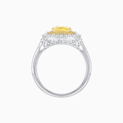 Double Halo Cushion Cut Fancy Yellow Diamond Ring with Tapered Diamond Accents