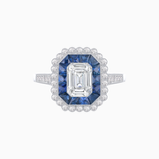 Platinum Emerald-Cut Diamond & Sapphire Halo Ring – Vintage Petal Elegance